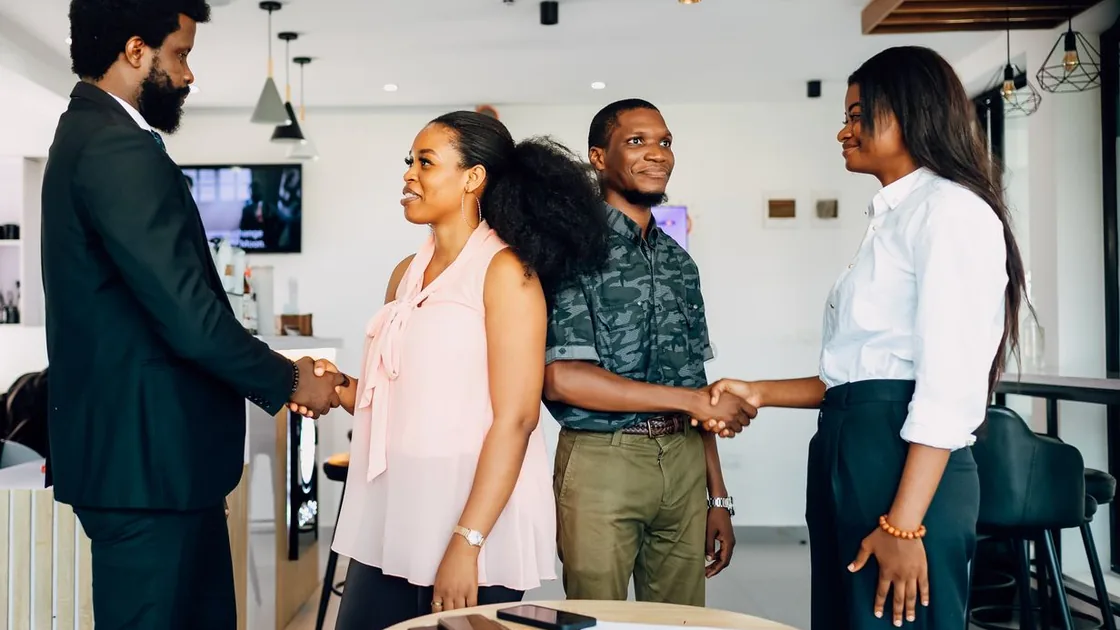 Business partners shaking hands after a meeting in Lagos